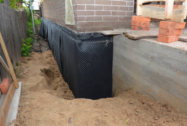 Happy homeowners after waterproofing job in Pardeeville